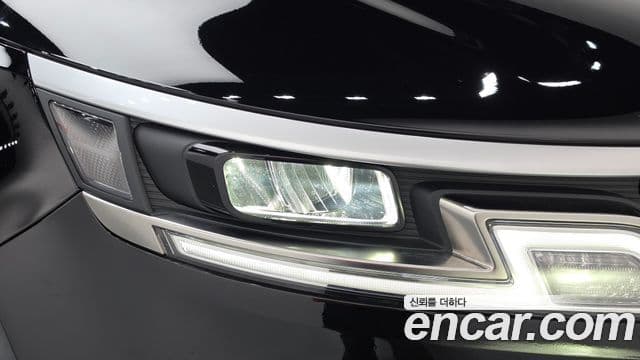 Kia Carnival 2022 — ფოტო 4/35