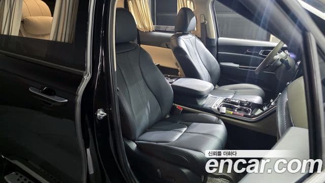Kia Carnival 2023 — ფოტო 12/20