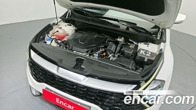 Kia Sportage 2021 — ფოტო 6/20