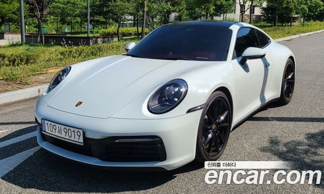 Porsche 911 2024 — ფოტო 1/18