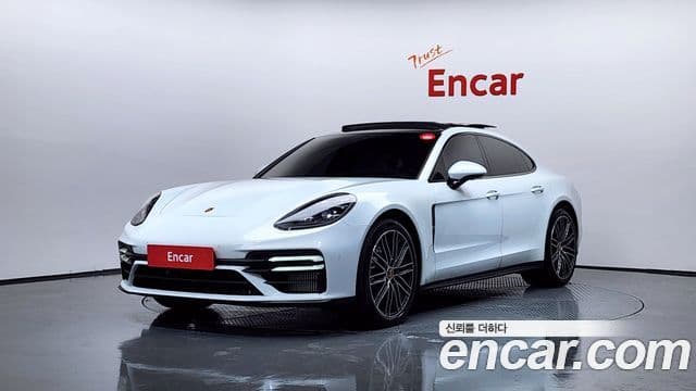 Porsche Panamera 2023 — Фото 1/20