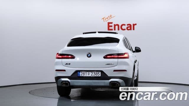 BMW X4 2022 — ფოტო 4/20