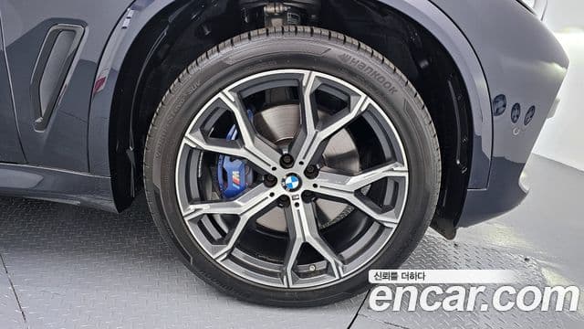 BMW X5 2021 — ფოტო 5/20