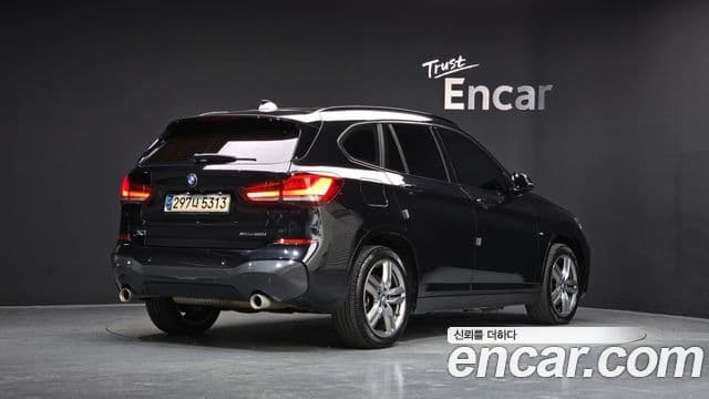 BMW X1 2021 — ფოტო 8/20