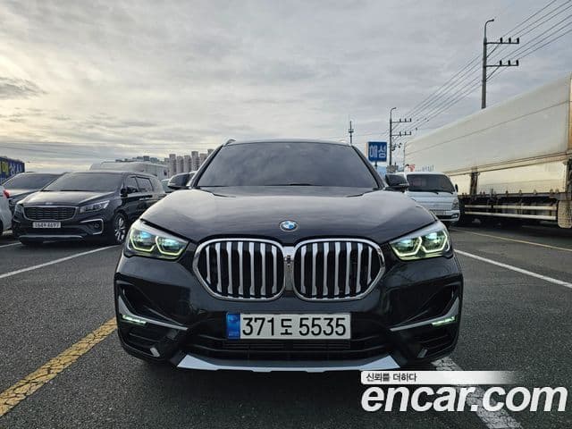 BMW X1 2021 — ფოტო 1/20