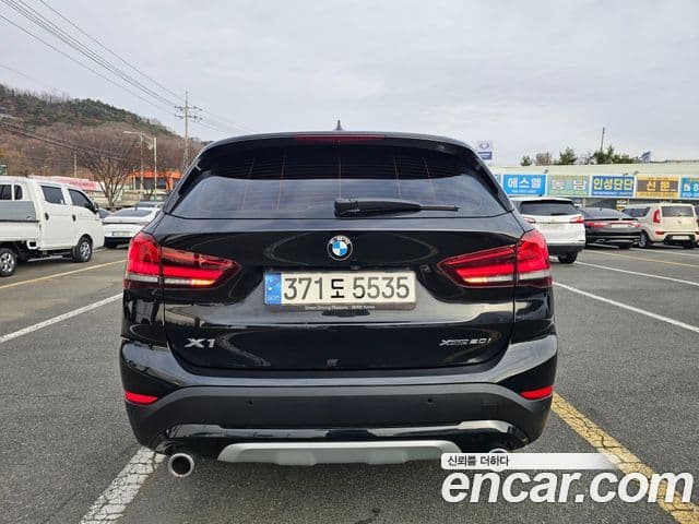 BMW X1 2021 — ფოტო 3/20