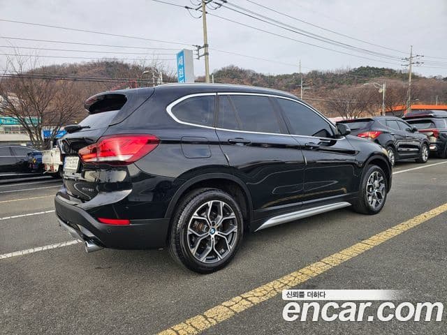 BMW X1 2021 — ფოტო 4/20