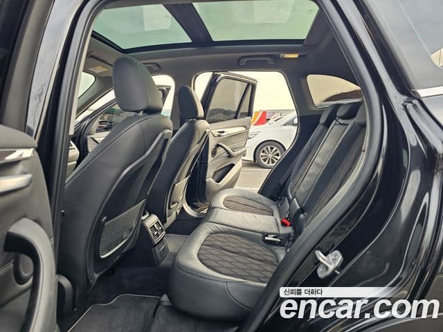 BMW X1 2021 — ფოტო 9/20