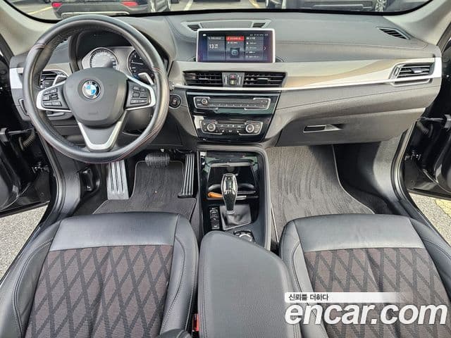 BMW X1 2021 — ფოტო 14/20
