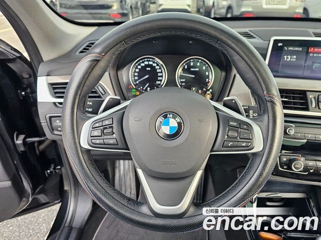 BMW X1 2021 — ფოტო 16/20