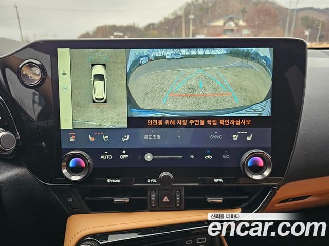 Lexus NX450h+ 2023 — ფოტო 19/20