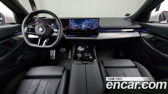 BMW 5 Series 2024 — ფოტო 7/20
