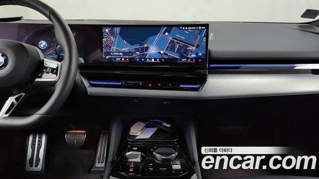 BMW 5 Series 2024 — ფოტო 14/20