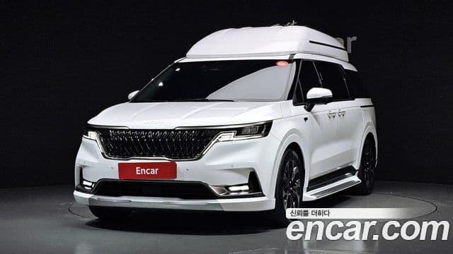 Kia Carnival 2023 — ფოტო 1/20