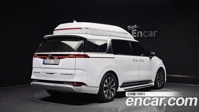 Kia Carnival 2021 — ფოტო 2/20