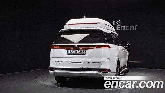 Kia Carnival 2021 — ფოტო 4/20