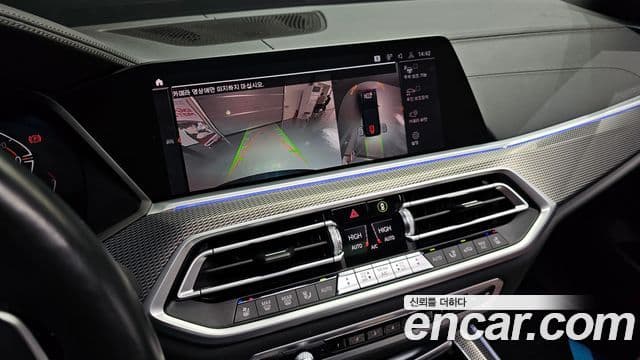 BMW X5 2021 — ფოტო 16/20