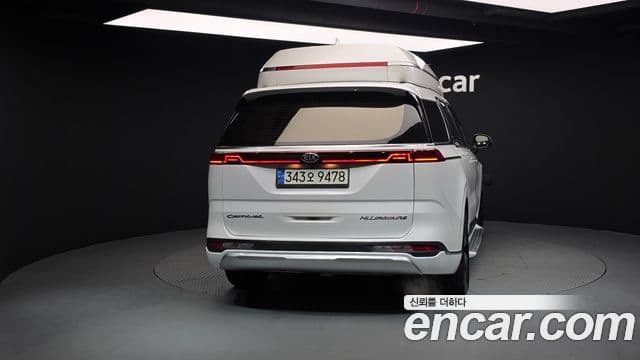 Kia Carnival 2021 — ფოტო 4/20
