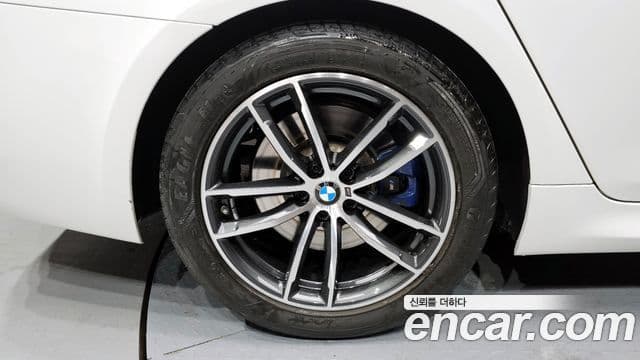 BMW 5 Series 2023 — ფოტო 4/20