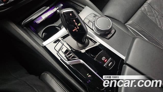BMW 5 Series 2023 — ფოტო 7/20