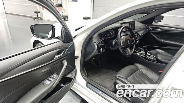 BMW 5 Series 2023 — ფოტო 8/20