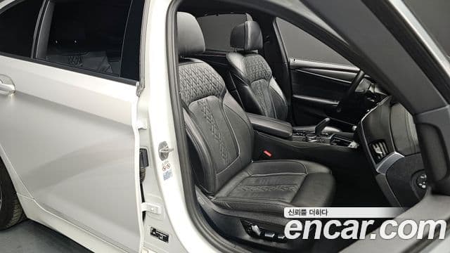 BMW 5 Series 2023 — ფოტო 12/20