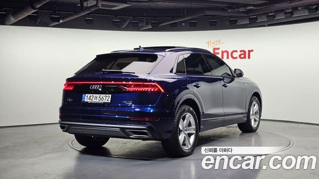 Audi Q7 2021 — Фото 2/20