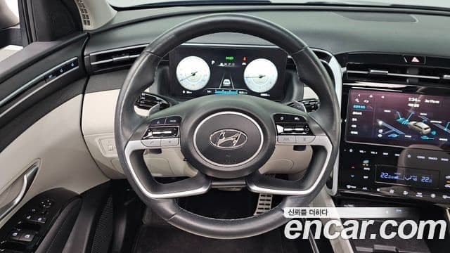 Hyundai Tucson Hybrid 2021 — ფოტო 2/20