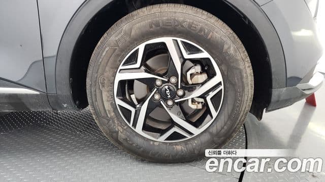 Kia Sportage 2021 — ფოტო 5/20