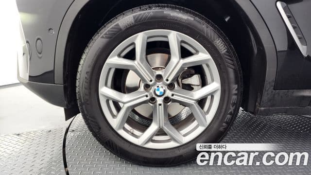 BMW X4 2023 — ფოტო 5/20
