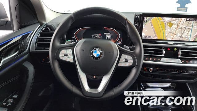 BMW X4 2023 — ფოტო 13/20