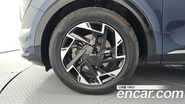 Kia Sportage 2021 — ფოტო 5/20