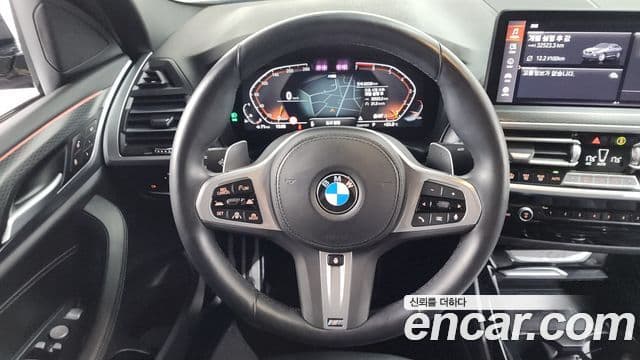 BMW X4 2022 — Фото 12/20