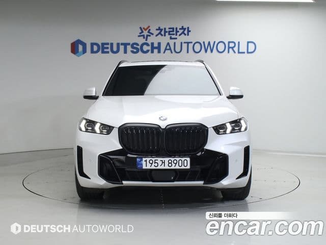 BMW X5 2023 — ფოტო 14/20