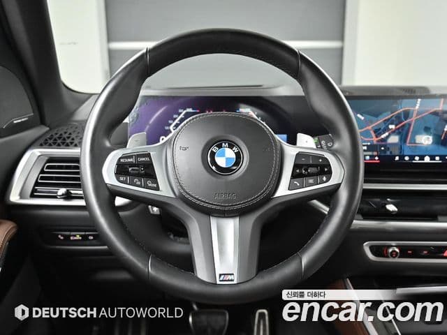 BMW X5 2023 — ფოტო 15/20