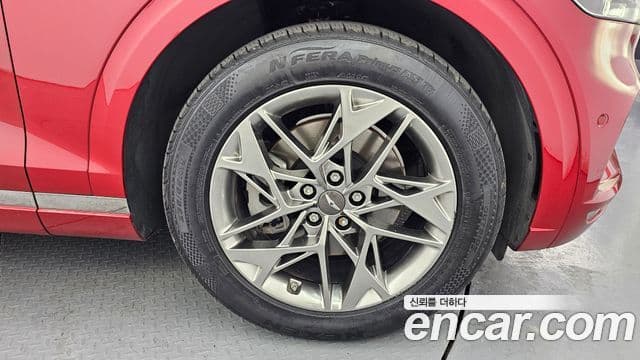 Genesis GV70 2021 — ფოტო 8/31