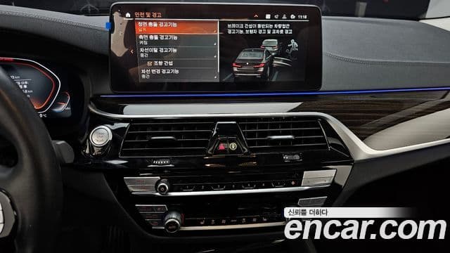 BMW 5 Series 2023 — ფოტო 27/34