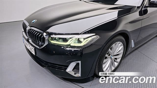 BMW 5 Series 2023 — ფოტო 24/34