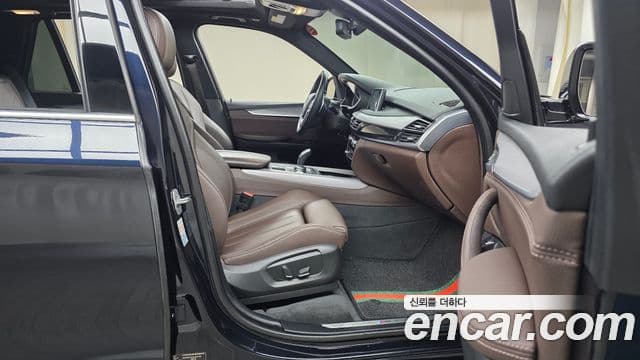BMW X5 2018 — ფოტო 11/20