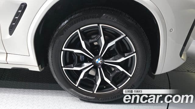 BMW X3 2022 — ფოტო 16/30