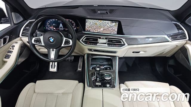 BMW X5 2022 — ფოტო 7/20