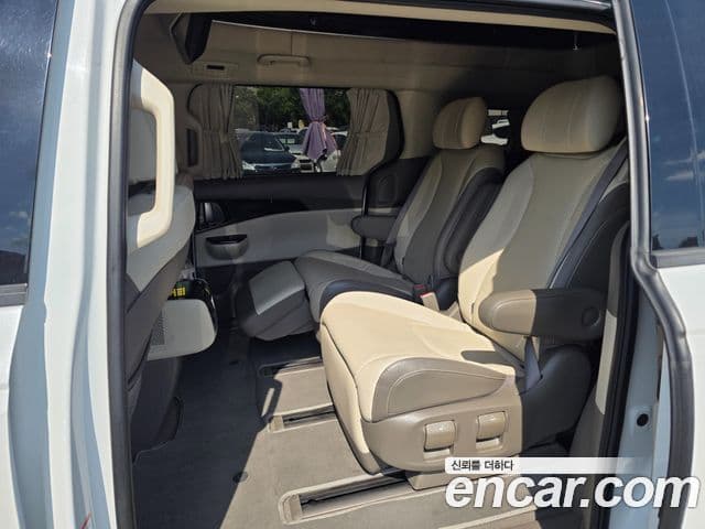 Kia Carnival 2021 — ფოტო 7/20