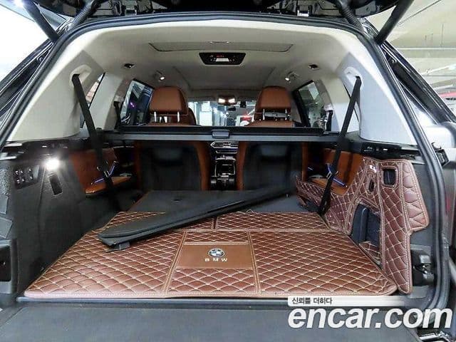 BMW X7 2021 — ფოტო 16/20