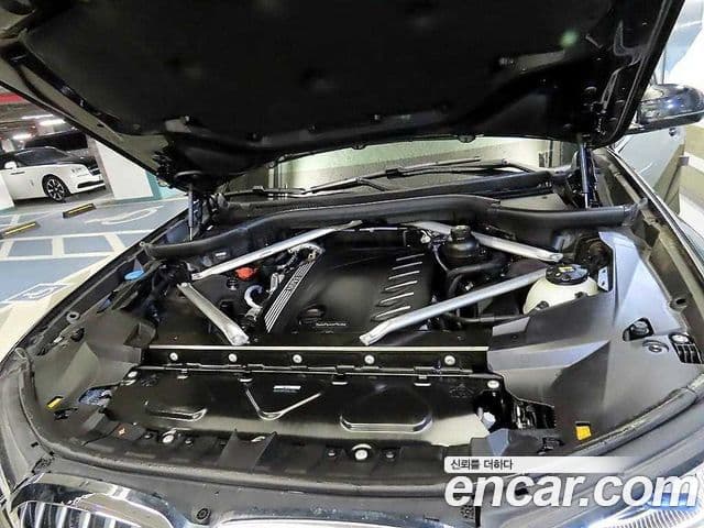 BMW X7 2021 — ფოტო 19/20