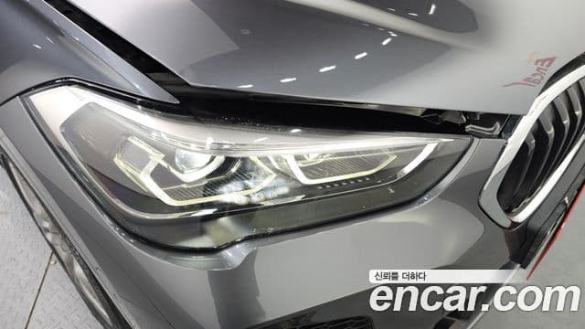 BMW X1 2021 — ფოტო 25/31