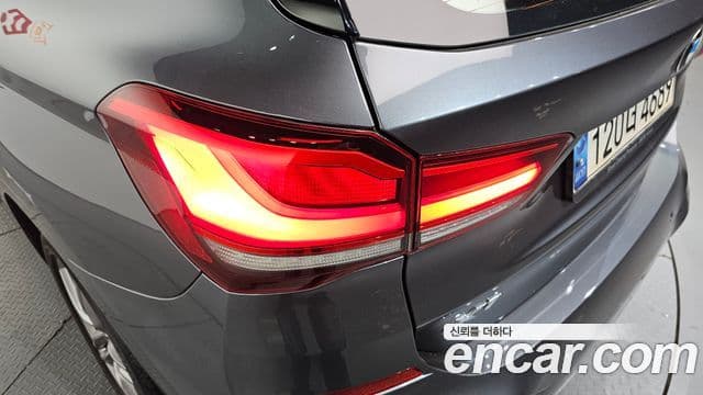 BMW X1 2021 — ფოტო 3/31