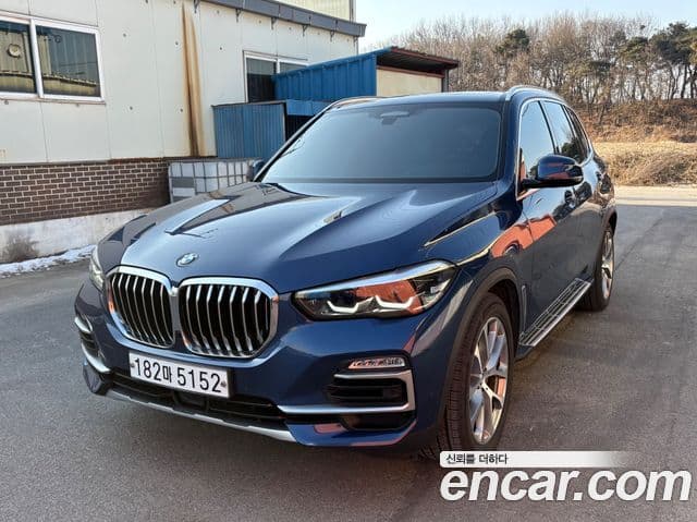 BMW X5 2020 — Фото 1/14