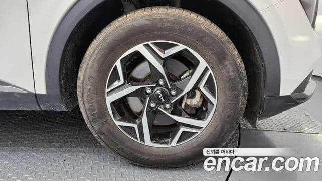 Kia Sportage 2023 — ფოტო 7/35