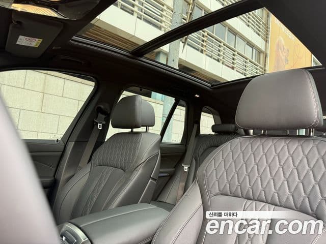 BMW X5 2025 — ფოტო 13/20