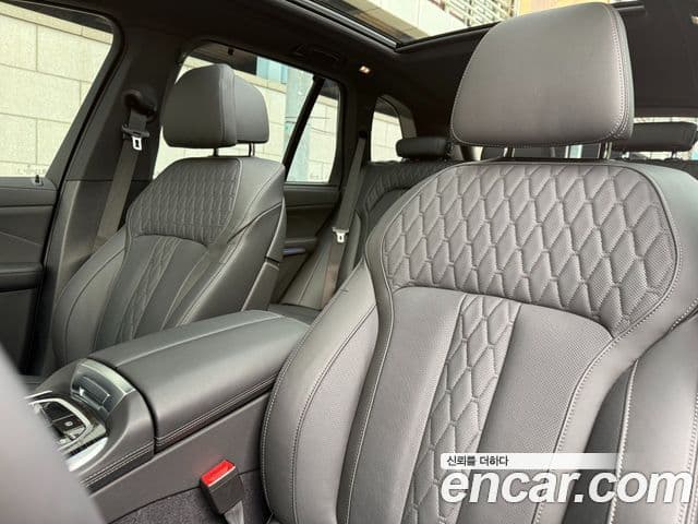 BMW X5 2025 — ფოტო 14/20